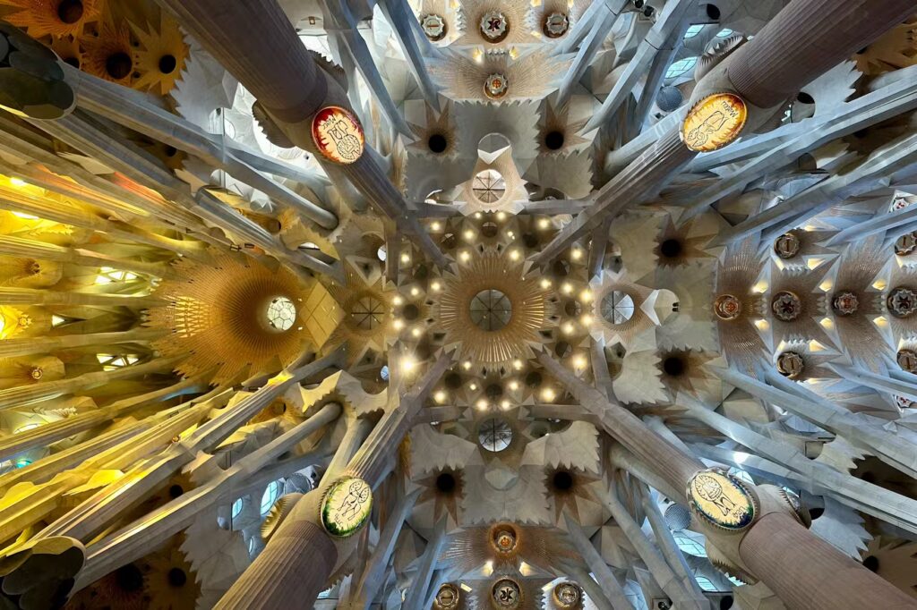 inside of the sagrada familia,visit the facade of the sagrada familia,tickets tours passes,inside sagrada familia barcelona visitor guide,explore inside sagrada familia in barcelona,sagrada familia interior,barcelona visitor guide,stained glass highlights,interior tips,ticket options,passes bundles,map info,Inside